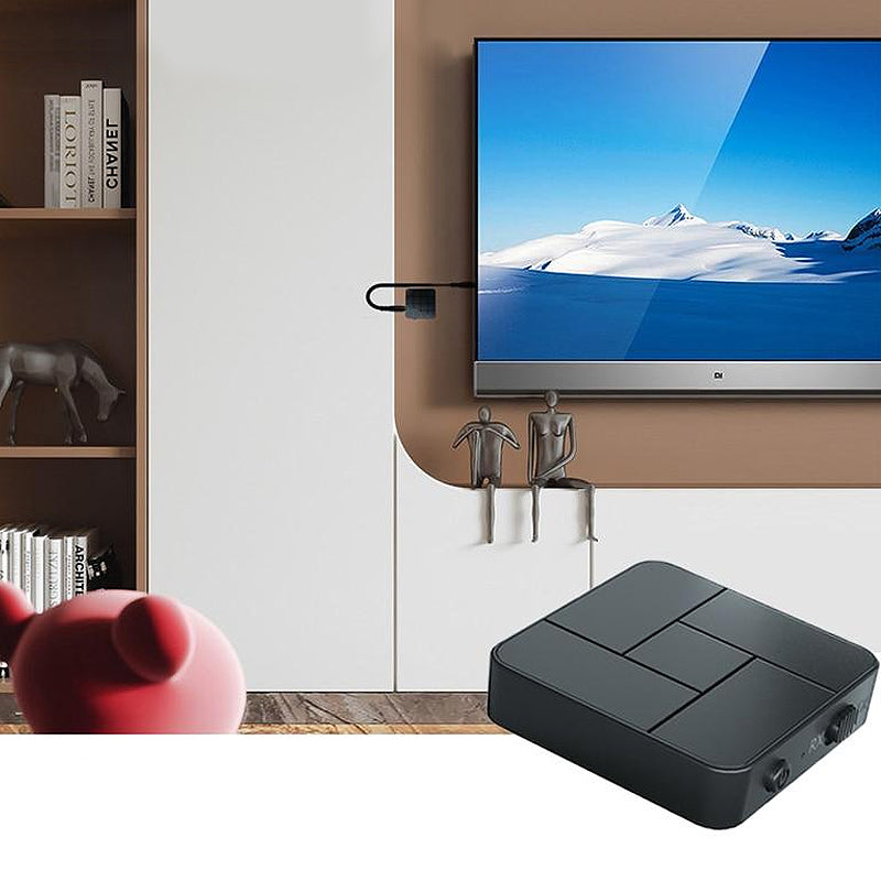 Trådlös Bluetooth 5.0 ljudsändare och mottagare i svart, kompakt design för TV och smartphones, ger trådlöst ljud.