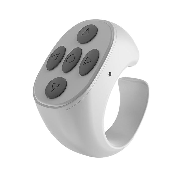 "Trådlös Bluetooth-ringfjärrkontroll för mobil, ergonomisk design, kompakt storlek, finns i svart, rosa, vit."