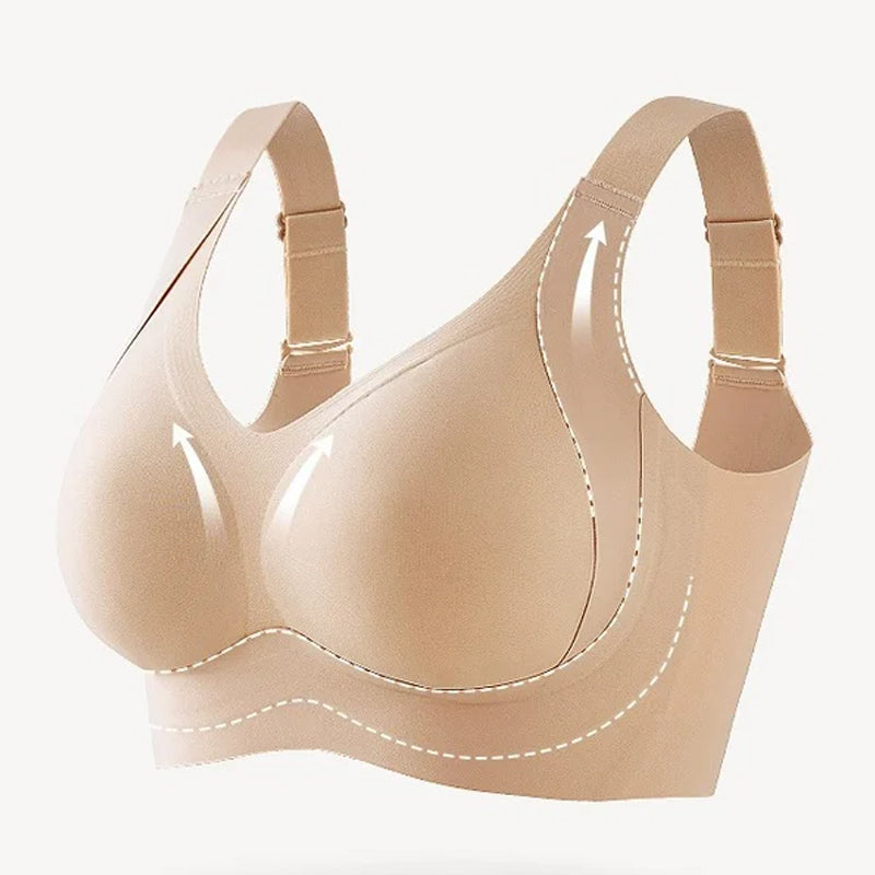 Skarvlös dam-BH i beige med sidostöd och fast stoppning för ökat stöd, smidig design för en slät silhuett.