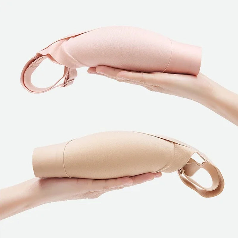 Skarvlös dam-BH i beige med sidostöd och fast stoppning för ökat stöd, smidig design för en slät silhuett.