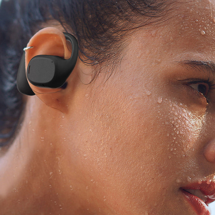 "Trådlösa Bluetooth sportöronsnäckor med öronkrokar, hängande design, öppet passform, IPX5 vattentäta, svart färg."