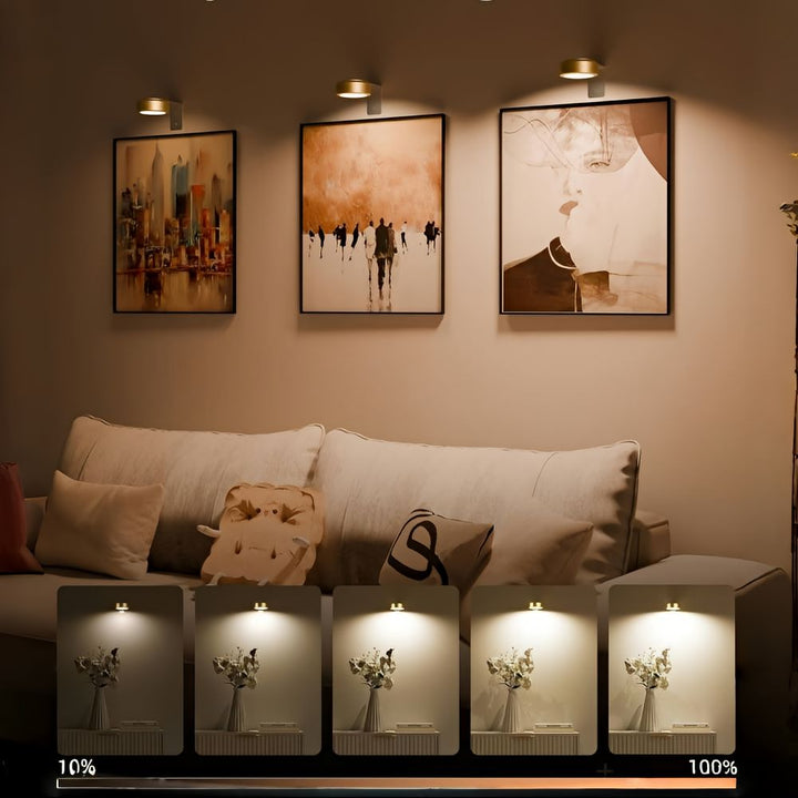 Stilren väggbelysning och LED-spotlight som framhäver tavlor i hemmet