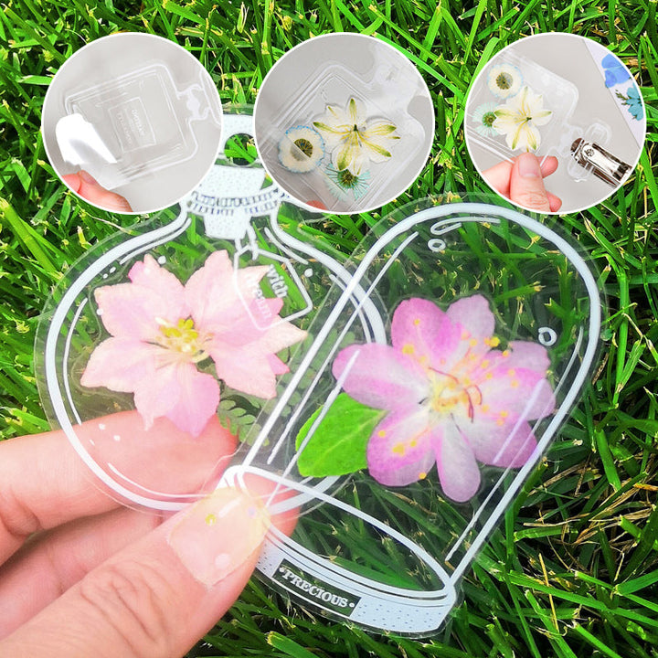 "Transparent bokmärke med torkade blommor, handgjord, elegant design, tunt och hållbart; perfekt för bokälskare."
