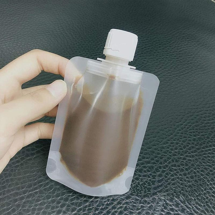 "Transparent påfyllningsbara reseflaskor set, kompakt design för schampo och duschgel, miljövänligt material."