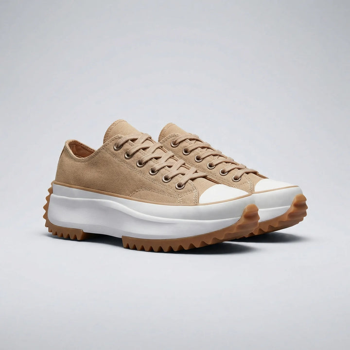 Sidovy av modern dam platåsneaker "Ashley". Tjock sula för extra höjd och stil.