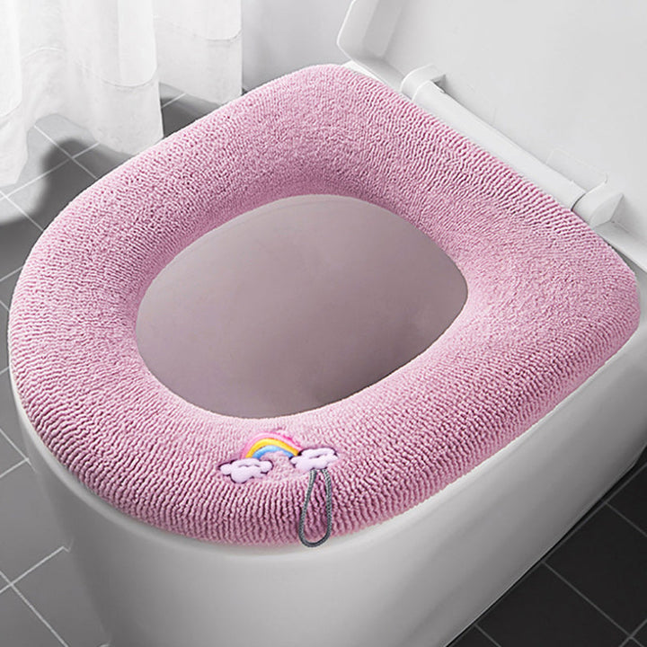 Ultra tjock toalettsitsöverdrag av polyester, elastisk passform, ljusrosa, bekväm och värmande lösning för kalla toaletter.