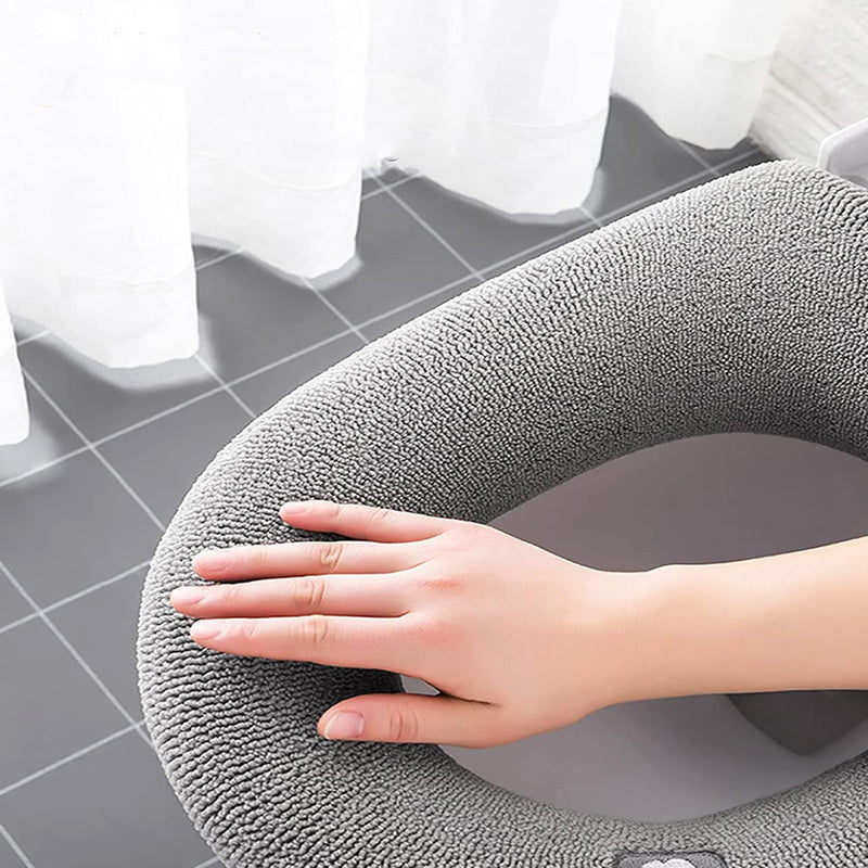 Ultra tjock toalettsitsöverdrag av polyester, elastisk passform, ljusrosa, bekväm och värmande lösning för kalla toaletter.