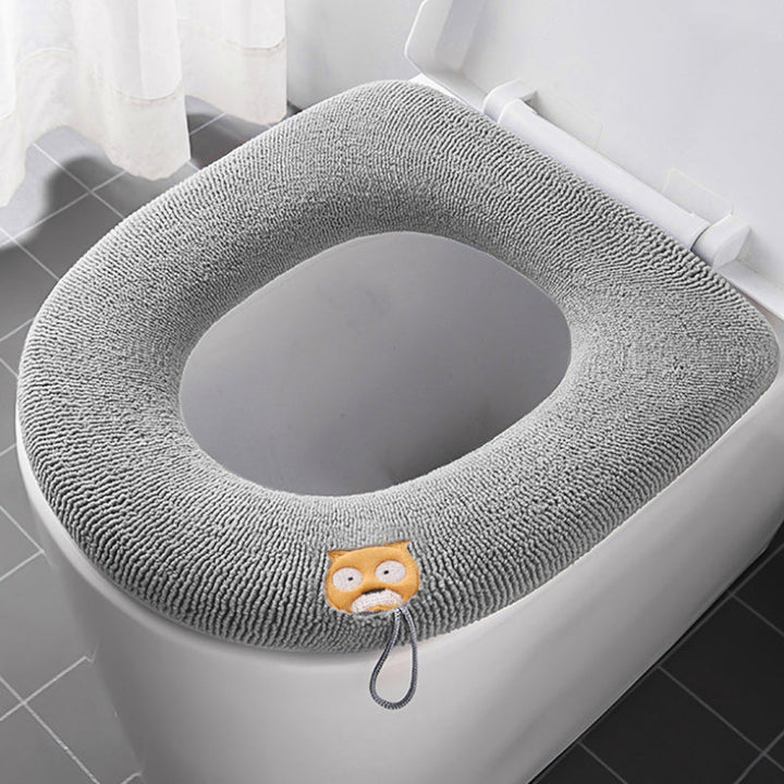 Ultra tjock toalettsitsöverdrag av polyester, elastisk passform, ljusrosa, bekväm och värmande lösning för kalla toaletter.