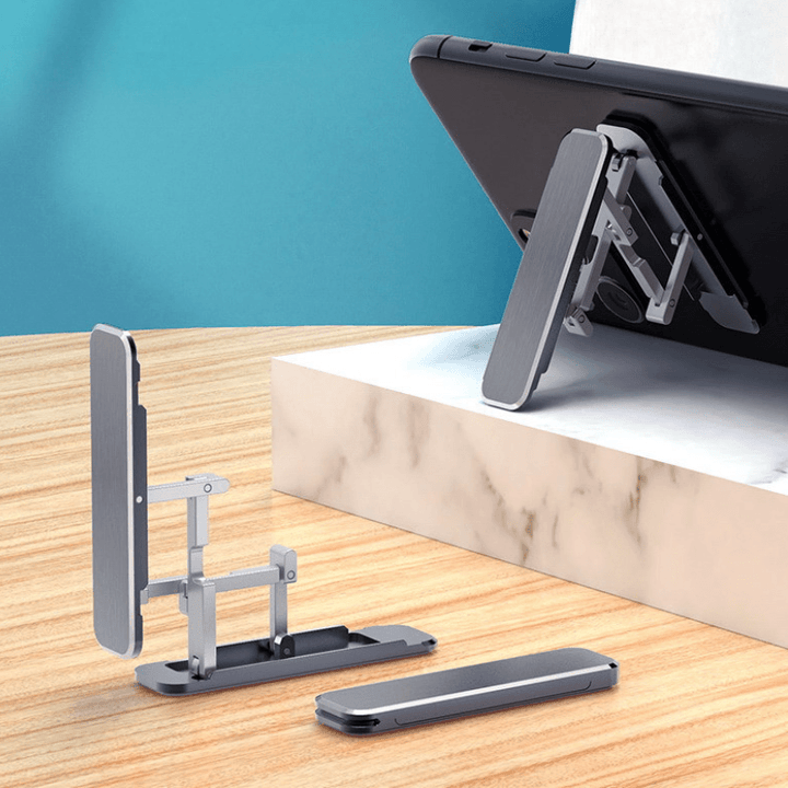 Ultratunn justerbar telefonstativ i aluminium, minimalistisk design, bärbar och vikbar för handsfree-koll på mobilen.