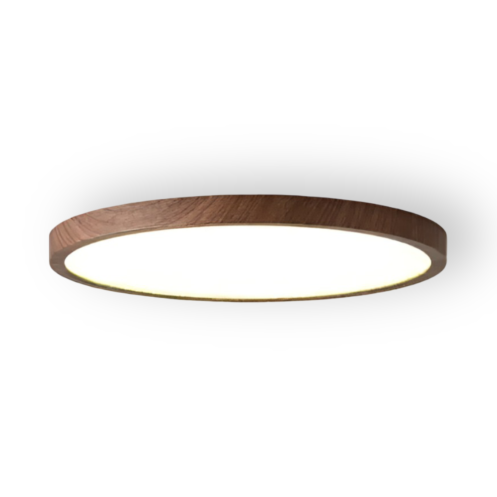Minimalistisk rund LED taklampa, ultratunn och modern. Perfekt för stilren inomhusbelysning.