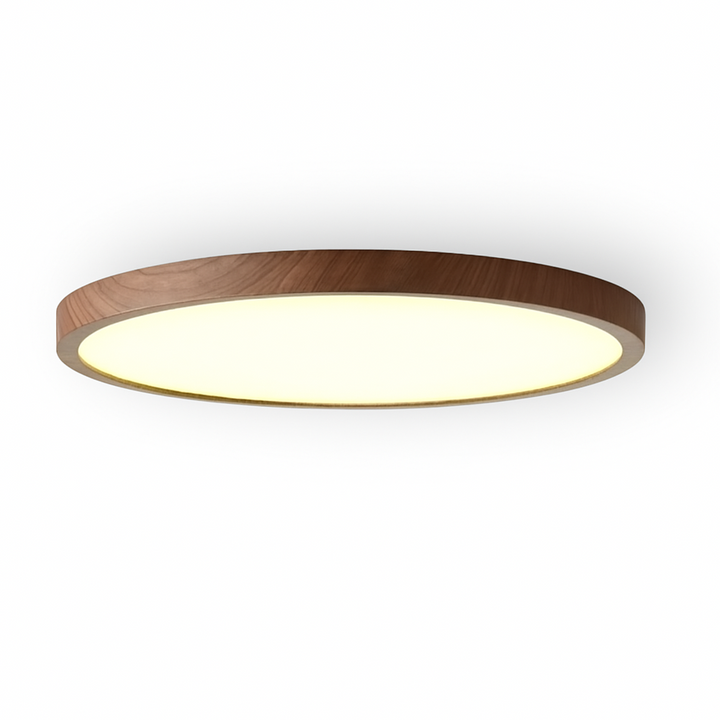 Jämn LED-belysning från en ultratunn rund taklampa. Modern och energieffektiv design.