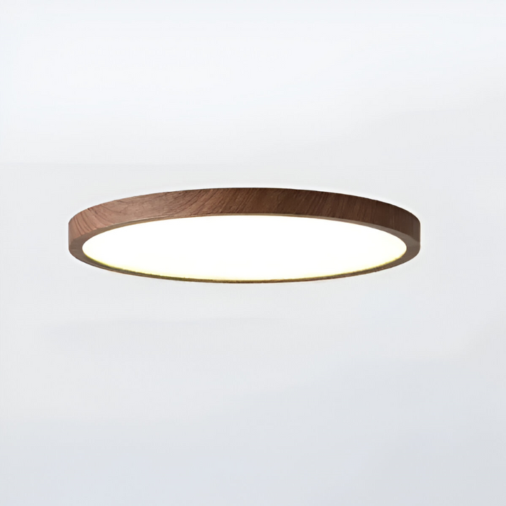 Elegant ultratunn rund LED taklampa, modern design som passar stilren heminredning.