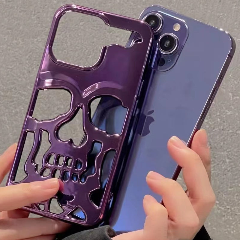 "Unikt dödskalleskal för iPhone med elegant plätering, erbjuder stilfullt skydd och trendig telefontillbehörsdesign."