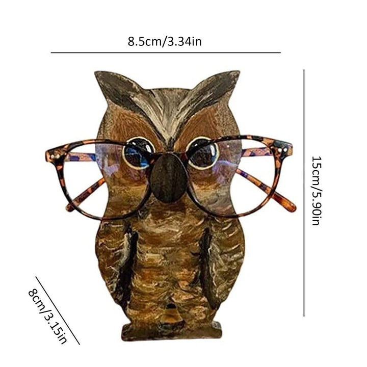 Unikt trä glasögonställ med djurdesign som gris och katt, perfekt för hemmet. Dekorativ och funktionell inredningsdetalj.