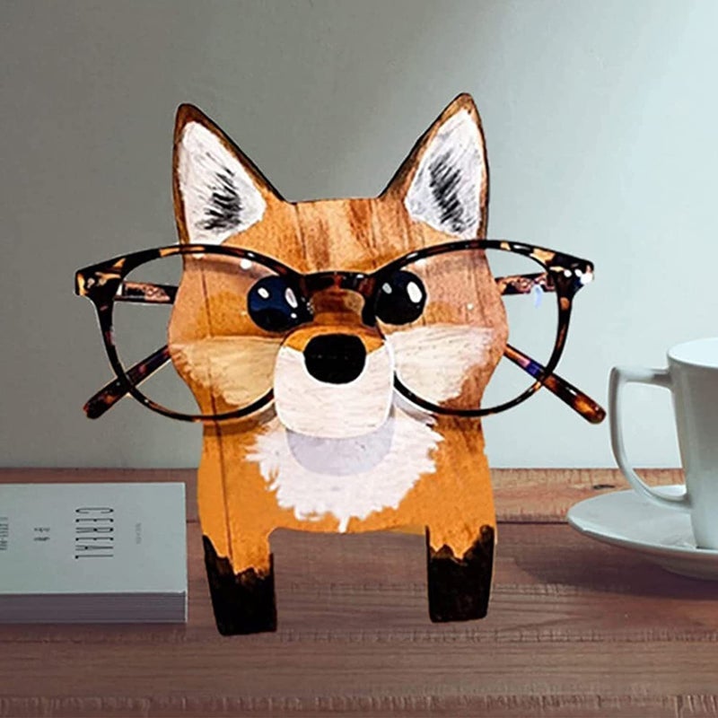 Unikt trä glasögonställ med djurdesign som gris och katt, perfekt för hemmet. Dekorativ och funktionell inredningsdetalj.