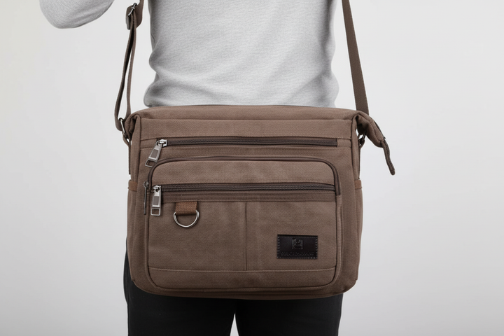 Detalj av robust canvas & dragkedja på unisex axelväska med RFID-skydd. Slitstark multifunktionell design.