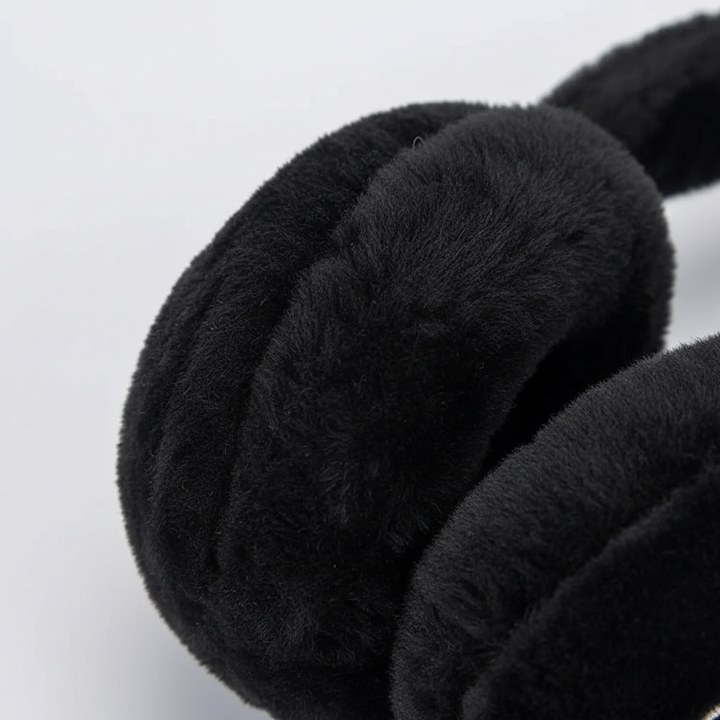 Unisex Bluetooth-hörlurar i fleece. Stilrena och varma, idealiska för pendling och musiklyssning.