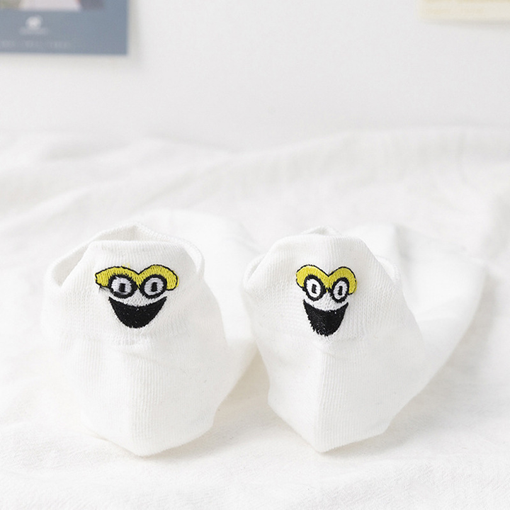 "Unisex broderade crew strumpor, japansk stil med smiley-mönster, mångsidig och elegant design, för alla årstider."
