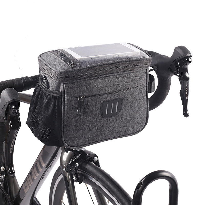 Unisex grå cykelväska med reflexremmar, rymlig design för nödvändigheter, lätt montering, stilren och säker.