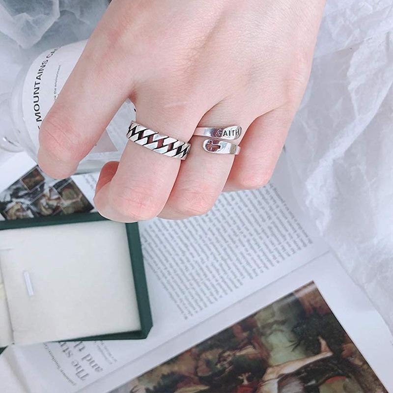 "Unisex justerbar silverring med ihålig korsdesign, elegant och enkel, kompatibel med alla fingrar och stilfull för alla."