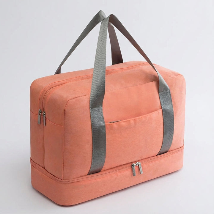 Kompakt Stowport kabinresväska med praktiska handtag, robusta hjul och ett unikt skofack för organiserad förvaring.
