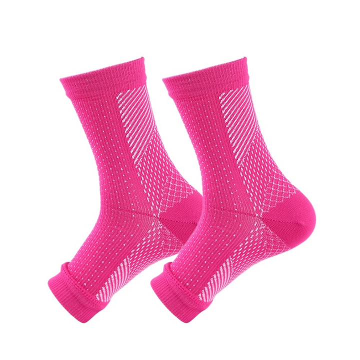 Bekväma kompressionsankelsockor för att minska svullnad och främja återhämtning. Unisex, effektiv fotvård.