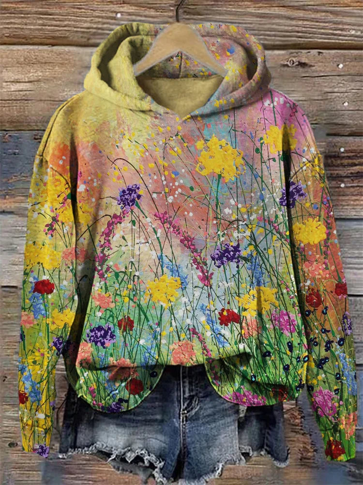 Unisex konstnärlig huvtröja med färgglatt blommönster, perfekt för bekväm fritid och avslappnad stil året runt.