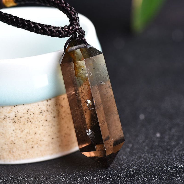 Naturligt sten halsband i hexagonform, perfekt som gåva för balans.