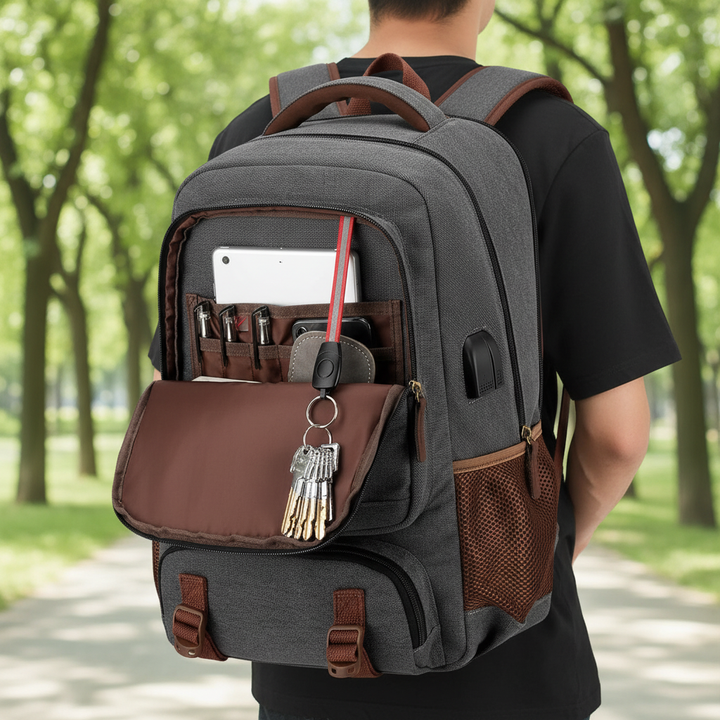 Unisex laptopryggsäck med USB-port och stöldskydd för 15,6-17,3 tums dator. Idealisk för jobb och skola.