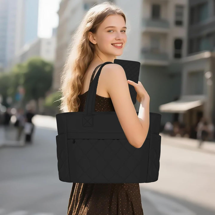 Organiserad kontorsväska Selvara. Den fackindelade designen håller arbetsmaterial och laptop ordentligt på plats.