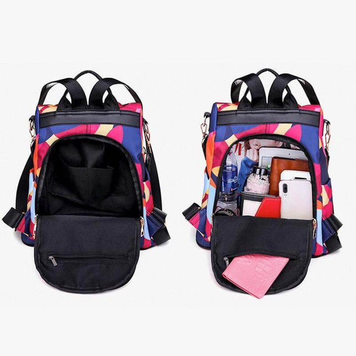 Rymlig laptopväska inuti en unisex ryggsäck med flera fack. Organiserad förvaring för teknik och tillbehör.