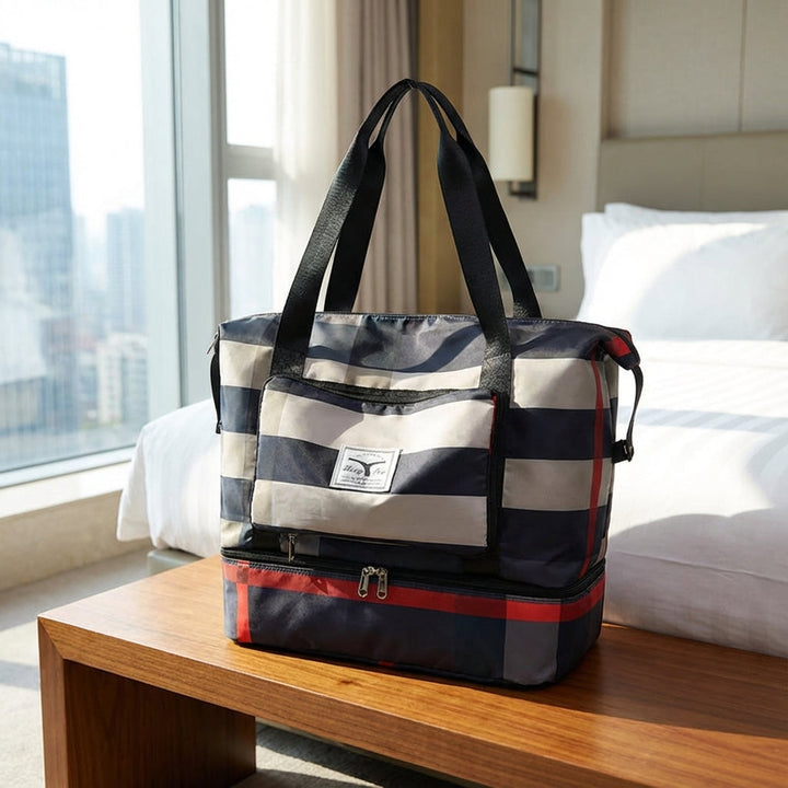 Unisex rymlig weekendväska med smart bottenfack. Perfekt för organiserad packning och handbagage.