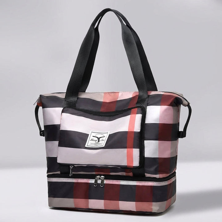 Modern unisex weekendväska med rymligt huvudfack och organiserat bottenfack. Lätt att packa.