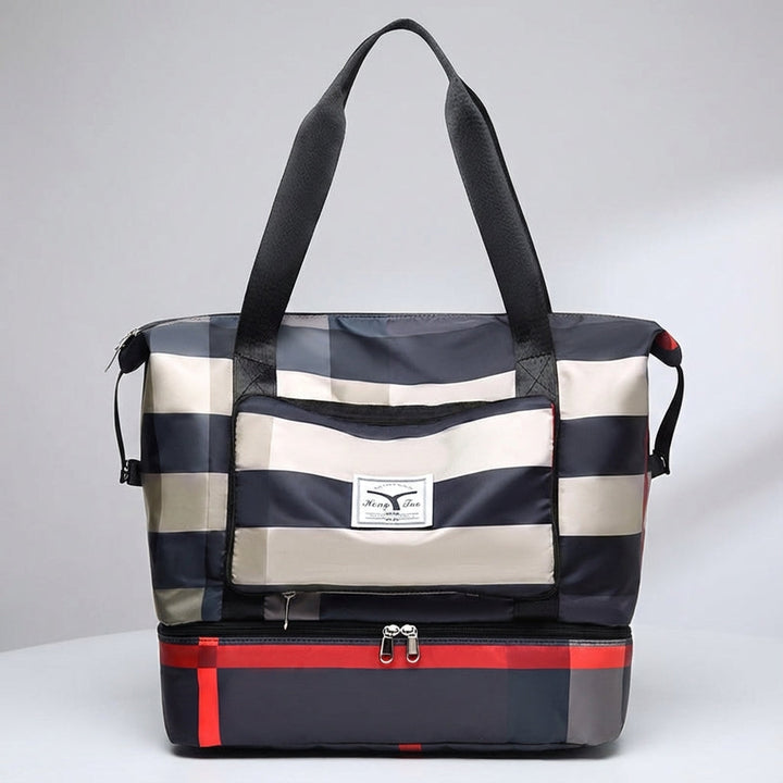 Mångsidig unisex weekendväska med funktionellt bottenfack. För packning till både sport och resa.