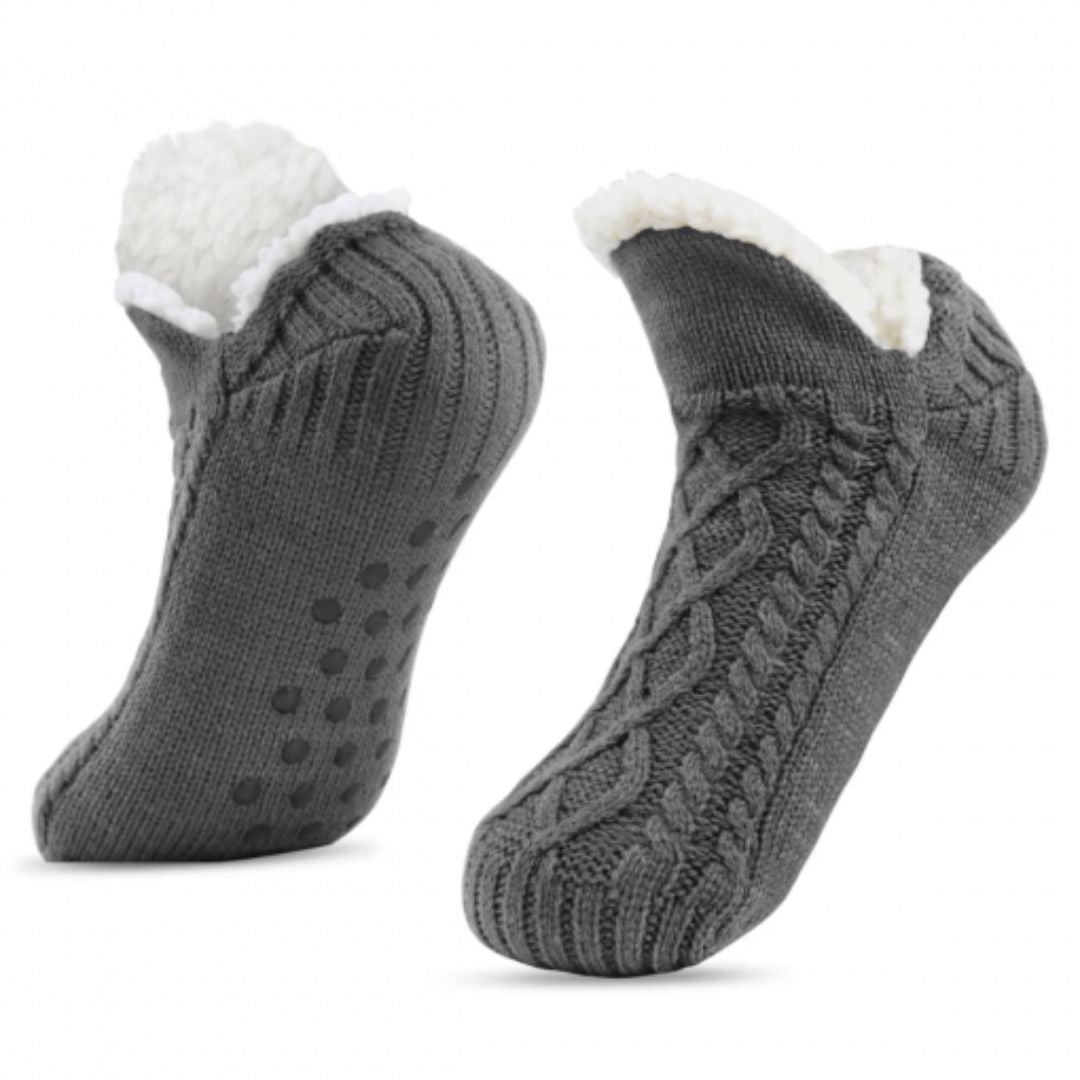 Unisex toffelsockor med mjuk fleece och halkskydd för varma, mysiga fötter inomhus. Perfekta hemmasockor.