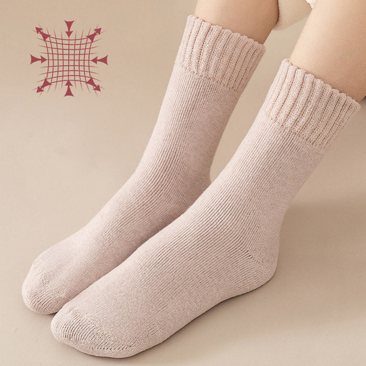 "Unisex värmeisolerade vinterstrumpor i akryl, mörkgrå med ribbade detaljer, håller fötterna varma och torra."