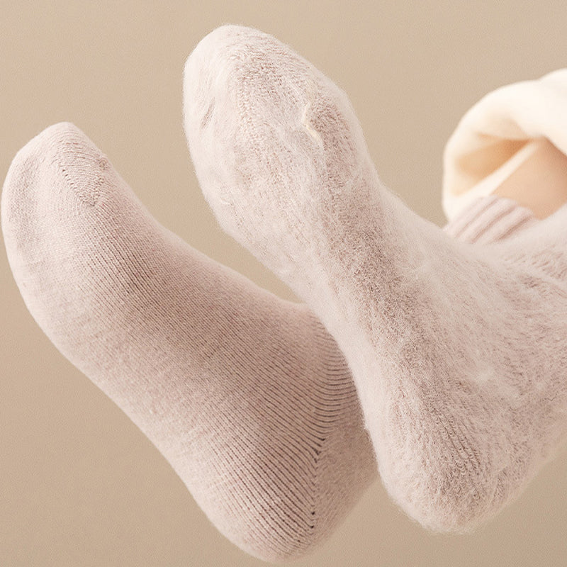 "Unisex värmeisolerade vinterstrumpor i akryl, mörkgrå med ribbade detaljer, håller fötterna varma och torra."