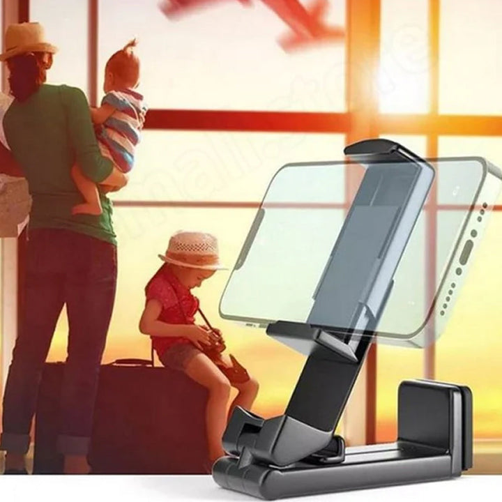"Universell 360° telefonhållare, kompakt, svart design, monterad på flygplansbricka för resenärer och äventyr."