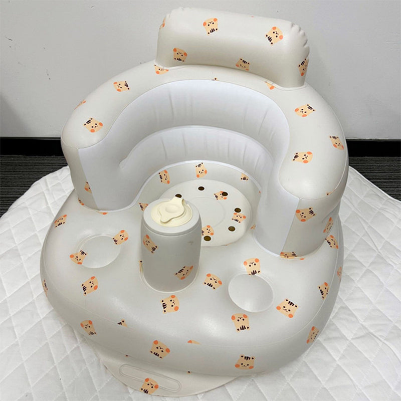 Uppblåsbar babysits med ergonomiskt ryggstöd, i pastellfärger, för barn 3-48 månader, ideal för trygg sittkomfort.