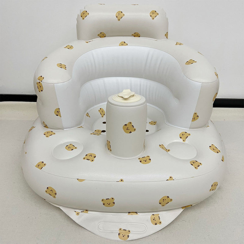 Uppblåsbar babysits med ergonomiskt ryggstöd, i pastellfärger, för barn 3-48 månader, ideal för trygg sittkomfort.