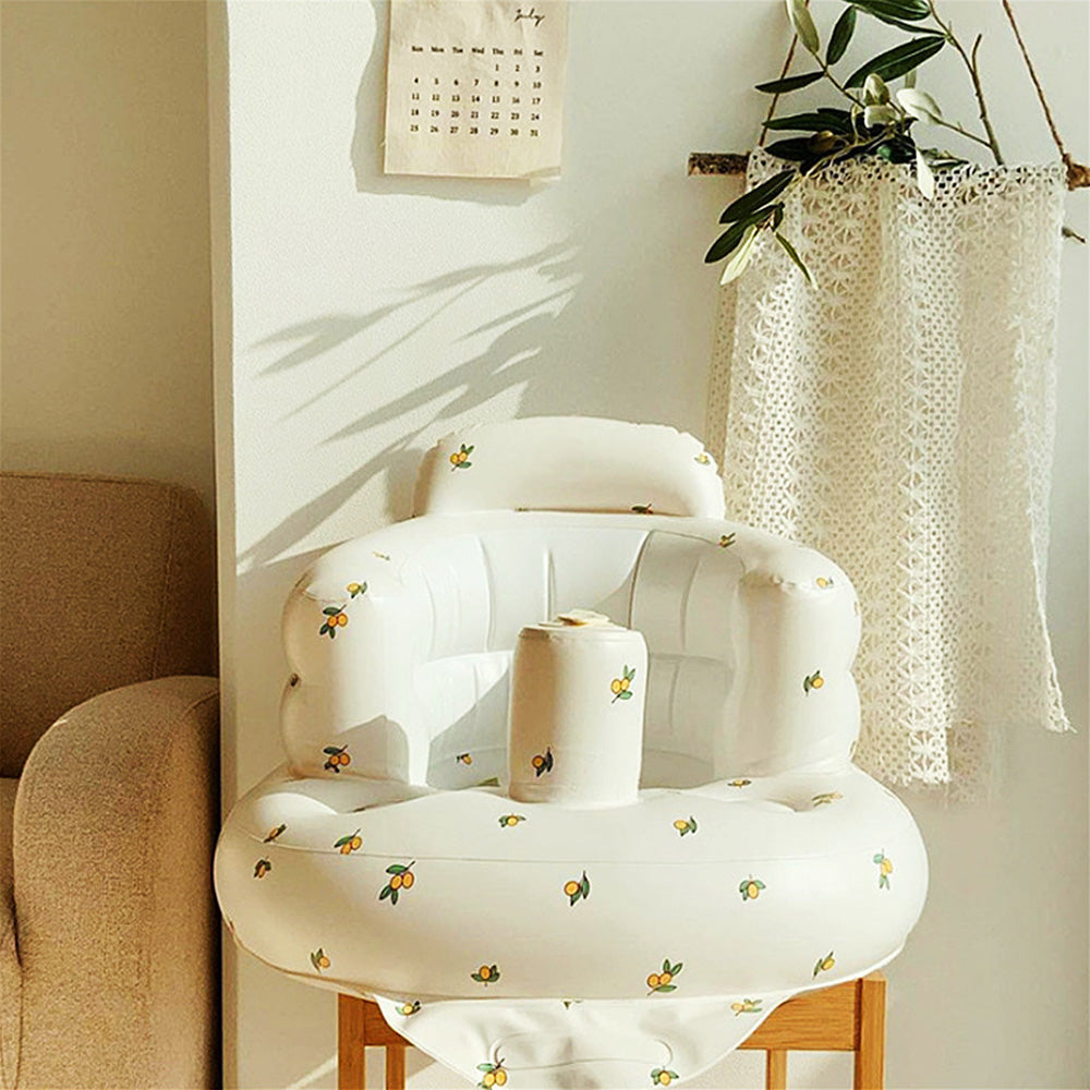 Uppblåsbar babysits med ergonomiskt ryggstöd, i pastellfärger, för barn 3-48 månader, ideal för trygg sittkomfort.
