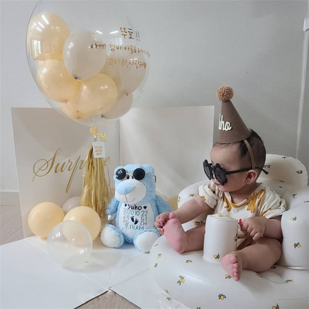 Uppblåsbar babysits med ergonomiskt ryggstöd, i pastellfärger, för barn 3-48 månader, ideal för trygg sittkomfort.