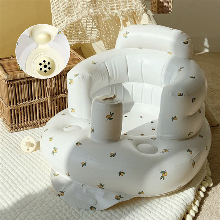 Uppblåsbar babysits med ergonomiskt ryggstöd, i pastellfärger, för barn 3-48 månader, ideal för trygg sittkomfort.