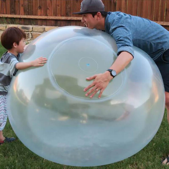 "Uppblåsbar rivsäker bubbelboll, rosa, grön och ljusblå, perfekt för barnlek utomhus, storlekar S till XL."