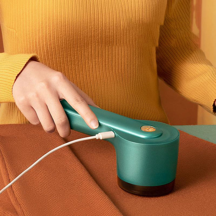 "USB-laddningsbar klädfjun borttagare, grön, enkel design, bioniskt knivnät, uppladdningsbar för alla tygtyper."