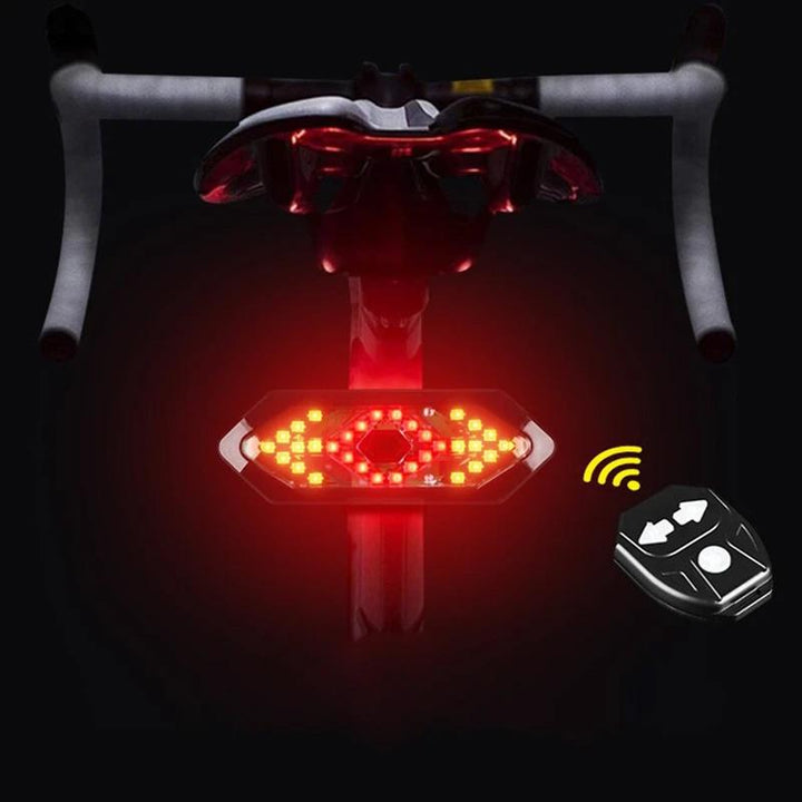 "USB-uppladdningsbart cykel bakljus med blinkers och horn, svart design, LED-ljus för säker cykling, vädertåligt."