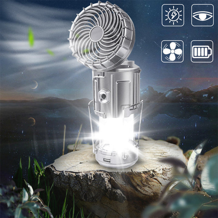 "Utomhus LED-campinglampa med inbyggd fläkt, robust ABS-design i silver och gyllene, perfekt för camping."