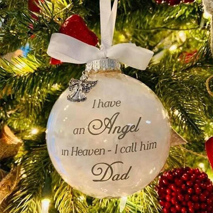 "Vackert minnesornament med angeldesign och fjäderdetaljer för stilfull heminredning och minnesvördnad."