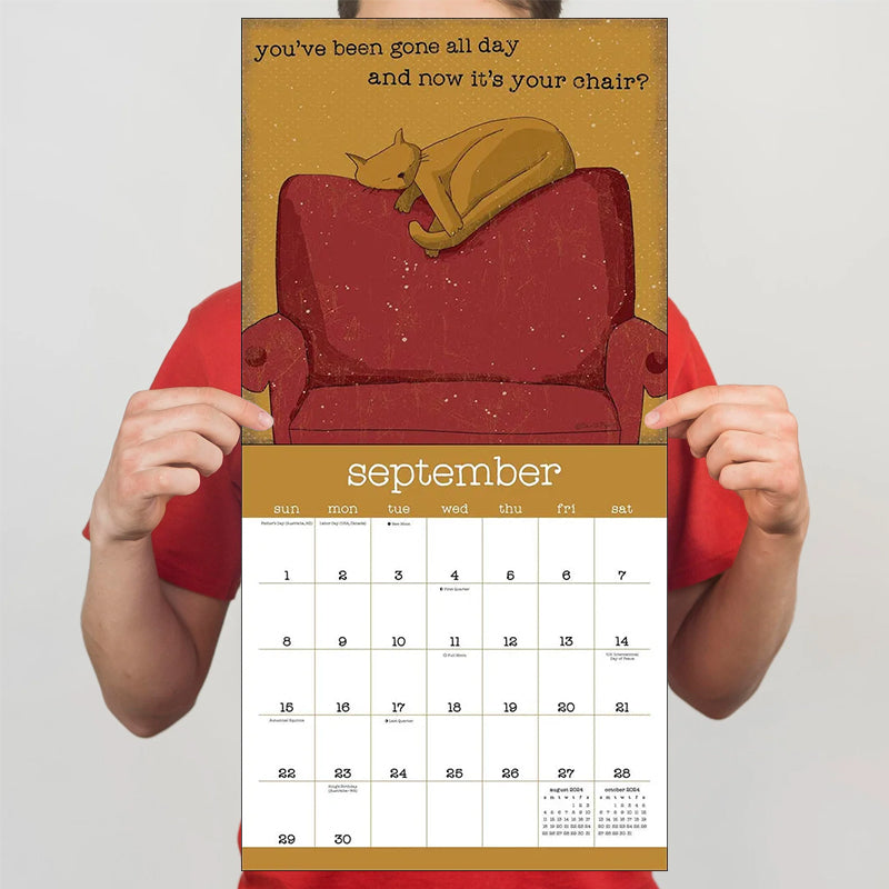 "Väggkalender 2024 med humoristiska kattbilder, perfekt för kattälskare som vill ha skratt i vardagen."