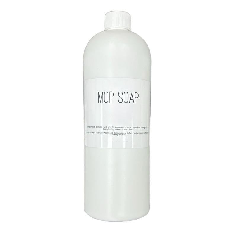 Väldoftande mopp-tvål i flaska, blommig och citrusdoft, för effektiv golvrengöring. Miljövänlig design, 750 ml.